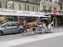 Pferd mit Kutsche auf dem H�henweg in Interlaken am 25. Juni 2018